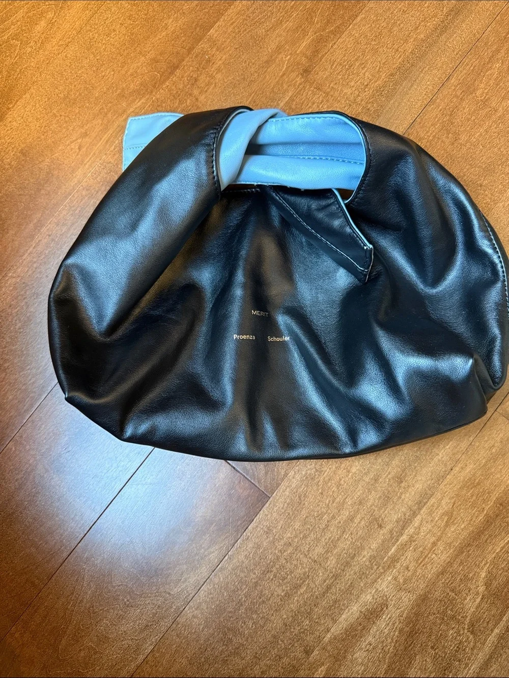 Proenza Schouler Black and Light Blue Leather Knot Wristlet Clutch